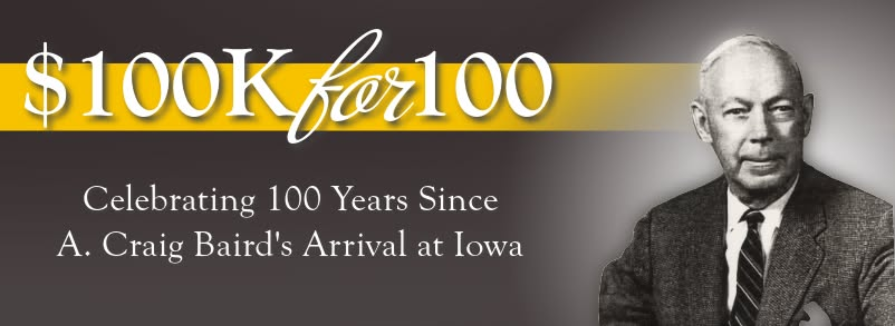 A banner the reads "100k for a hundred years, celebrating 100 years since A Craig Baird arrival at iowa